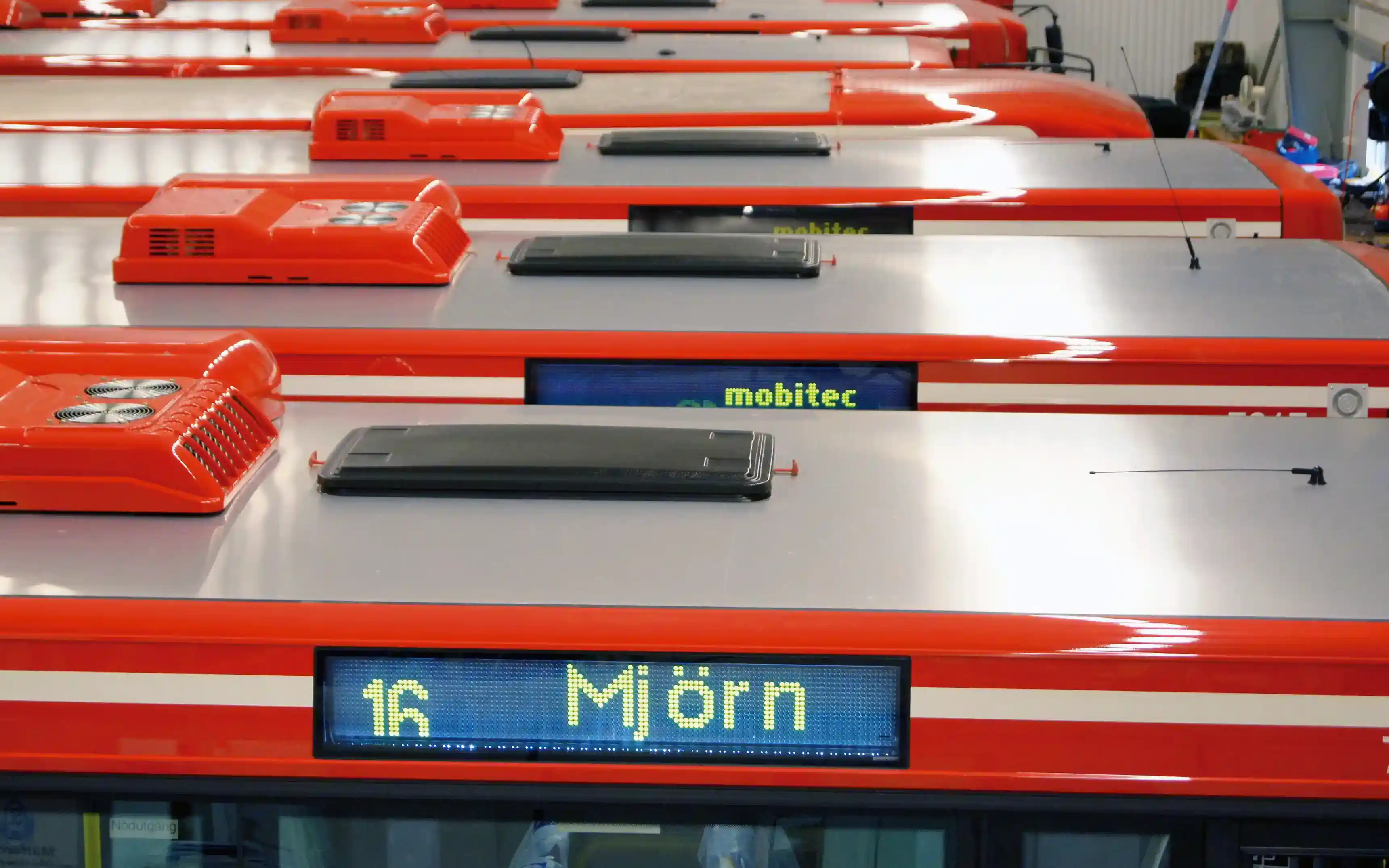 Taken på flertalet bussar ståendes på en bussdepå utanför Stockholm.